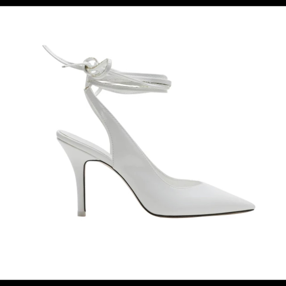 Looking to sell these brand new beautiful white strap heels.White patent leather